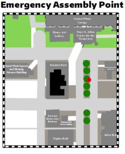 The emergency assembly point for Schmitz Hall is denoted with the black star in the red circle.